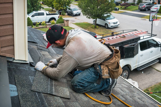 Professional Roofing technician working in El Granada, CA